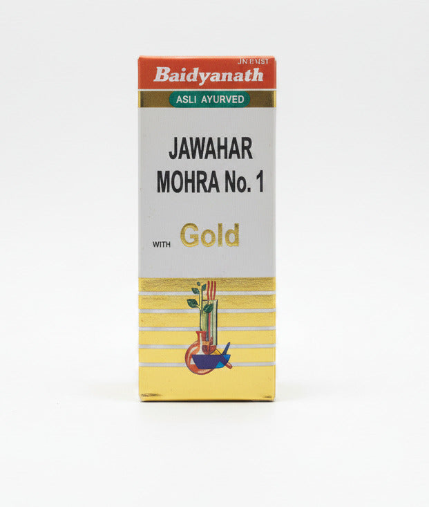 Baidyanath Jawahar Mohra No. 1 Gold packaging on a metallic surface