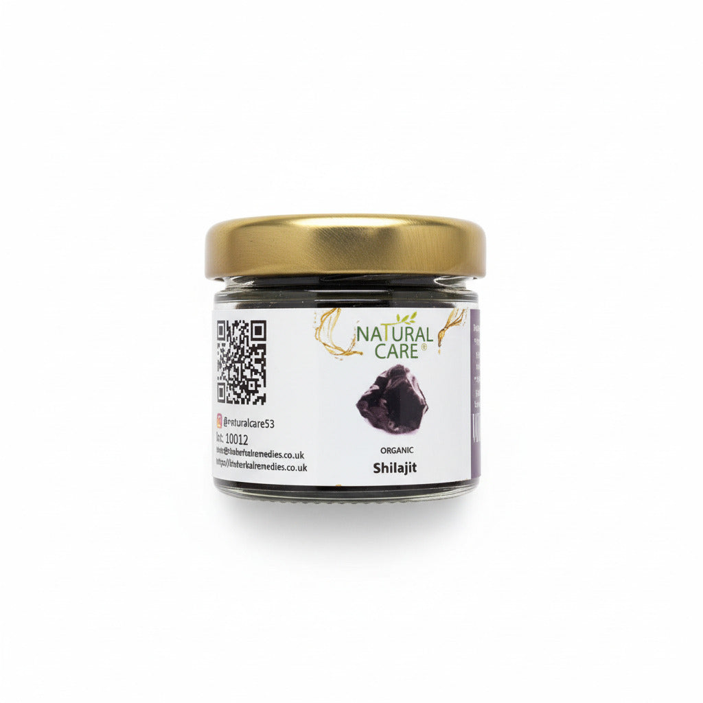 Jar of Shilajit with a label on a white surface
