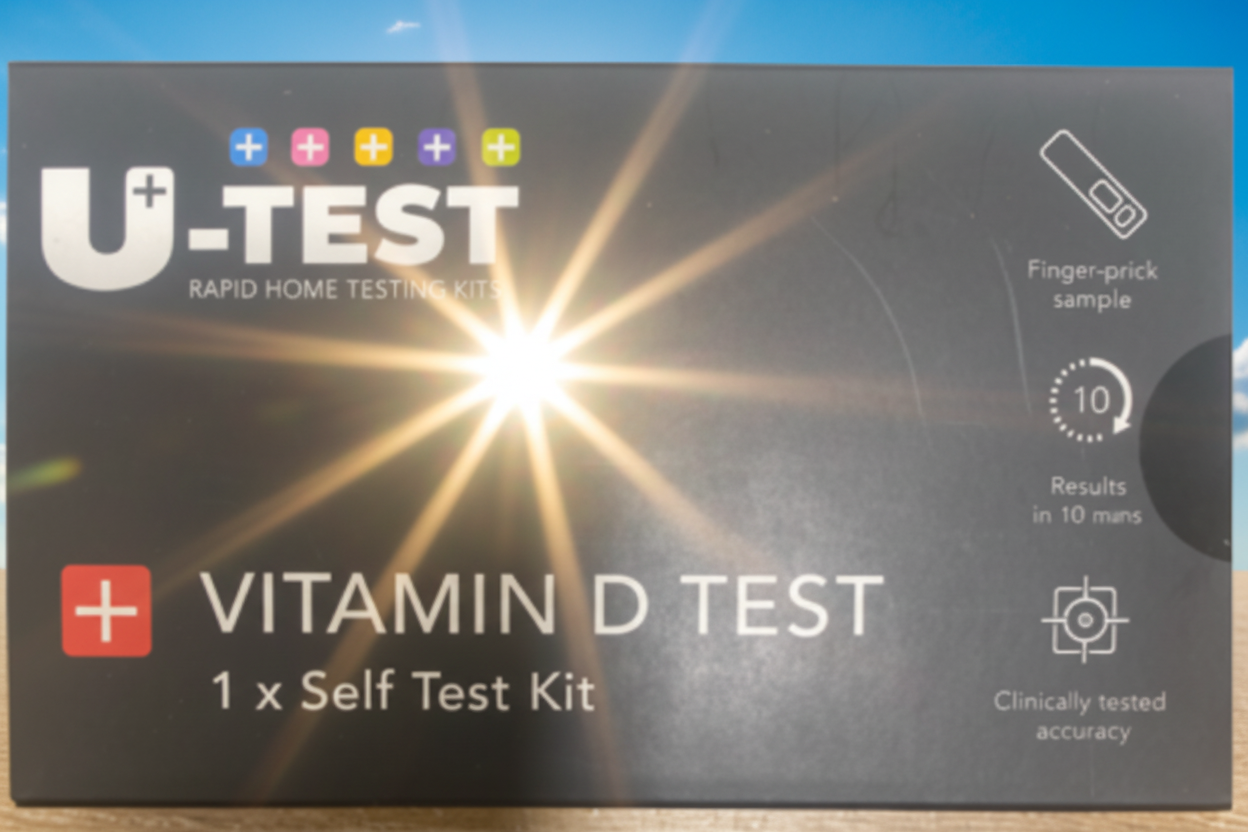 U-Test Vitamin D Test self-test kit packaging on a wooden surface