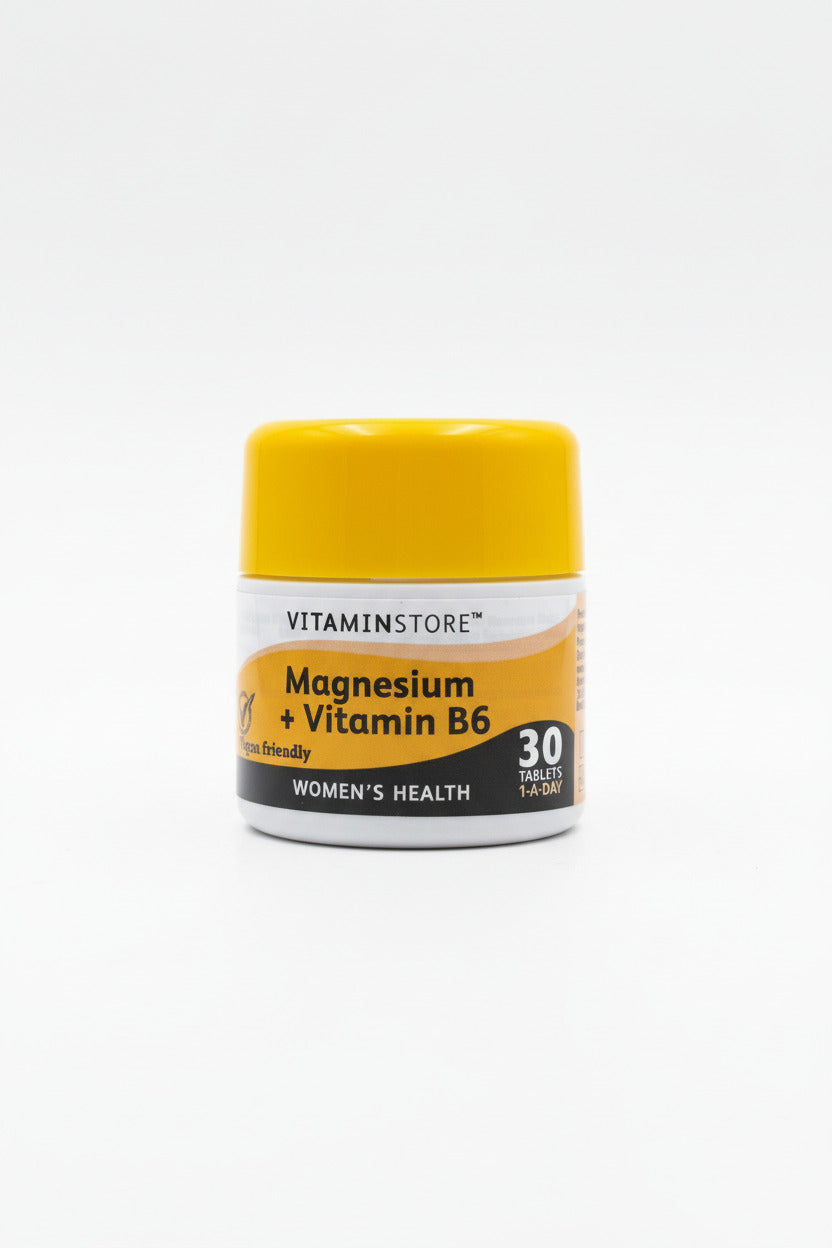 Vitamin container labeled 'Vitaminstore' with magnesium and vitamin B6 on a neutral background