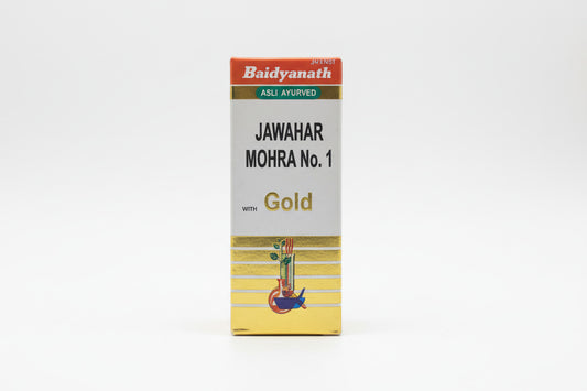 Baidyanath Jawahar Mohra No. 1 Gold packaging on a metallic surface