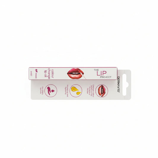 Lip product packaging on a desk with a keyboard in the background