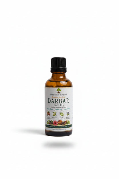 Bottle of Darbar Hair Oil on a table