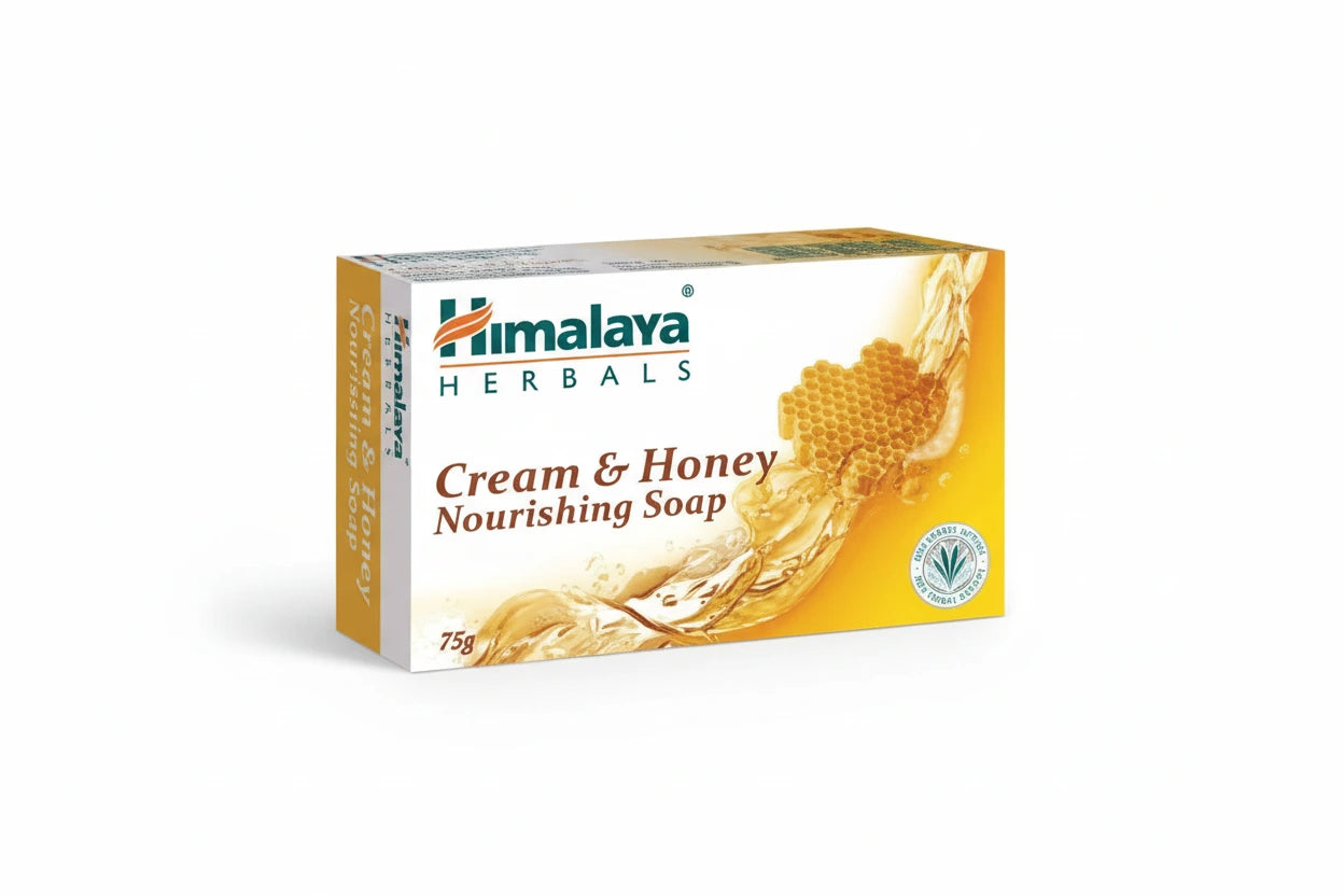 Packaging of Himalaya Herbals Cream and Honey Nourishing Soap with a honeycomb design and product information displayed
