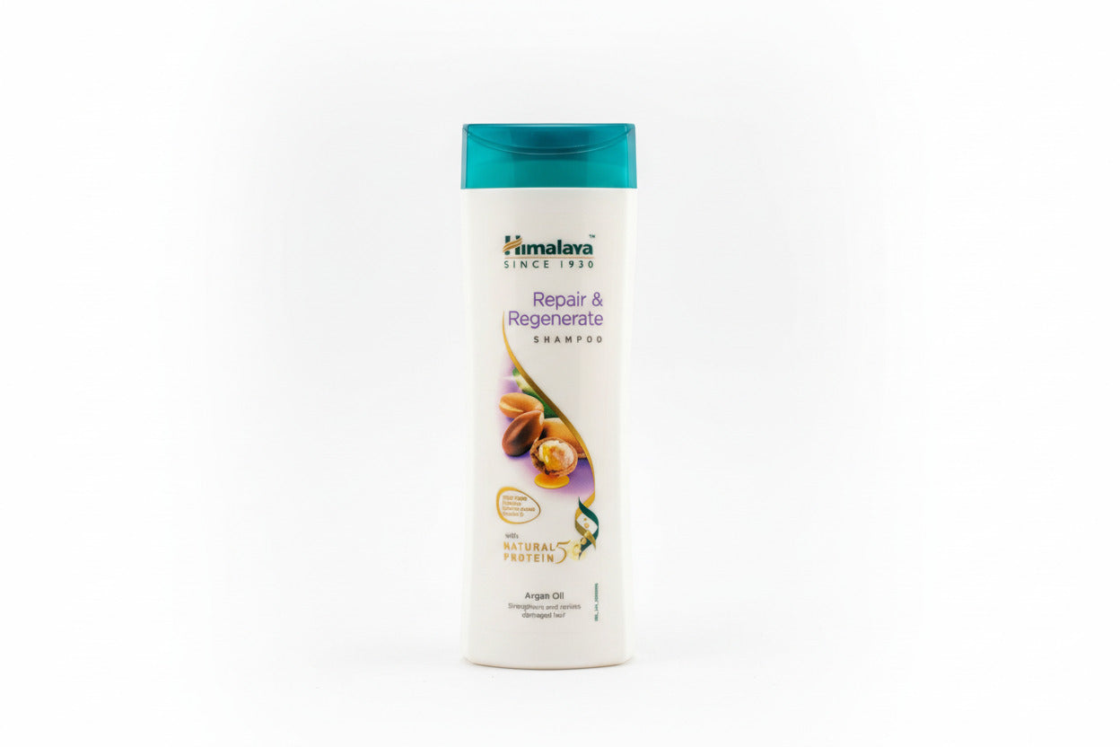 Himalaya Repair & Regenerate Shampoo bottle on a wooden surface