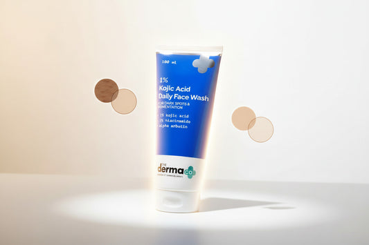 Tube of The Derma Co. 1% Kojic Acid Daily Face Wash on a beige surface