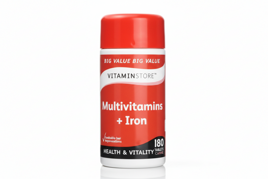 Multivitamin supplement container with red and white label on a white background