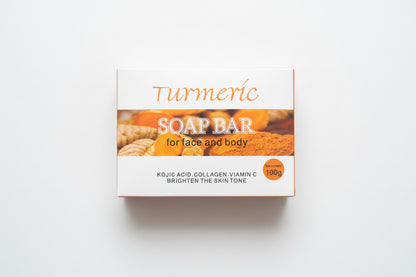 Box of Turmeric Soap Bar for face and body on a wooden surface