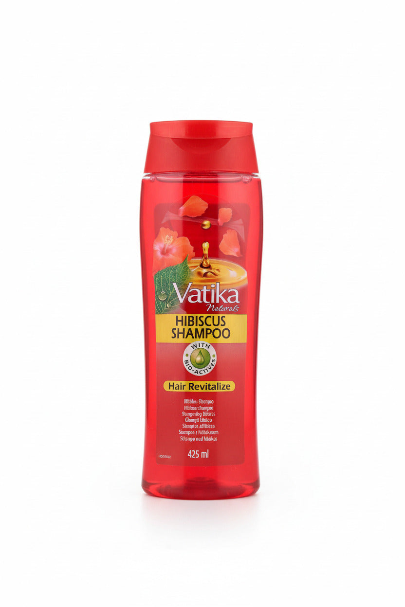Vatika hibiscus shampoo bottle on a wooden surface