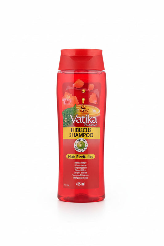 Vatika hibiscus shampoo bottle on a wooden surface