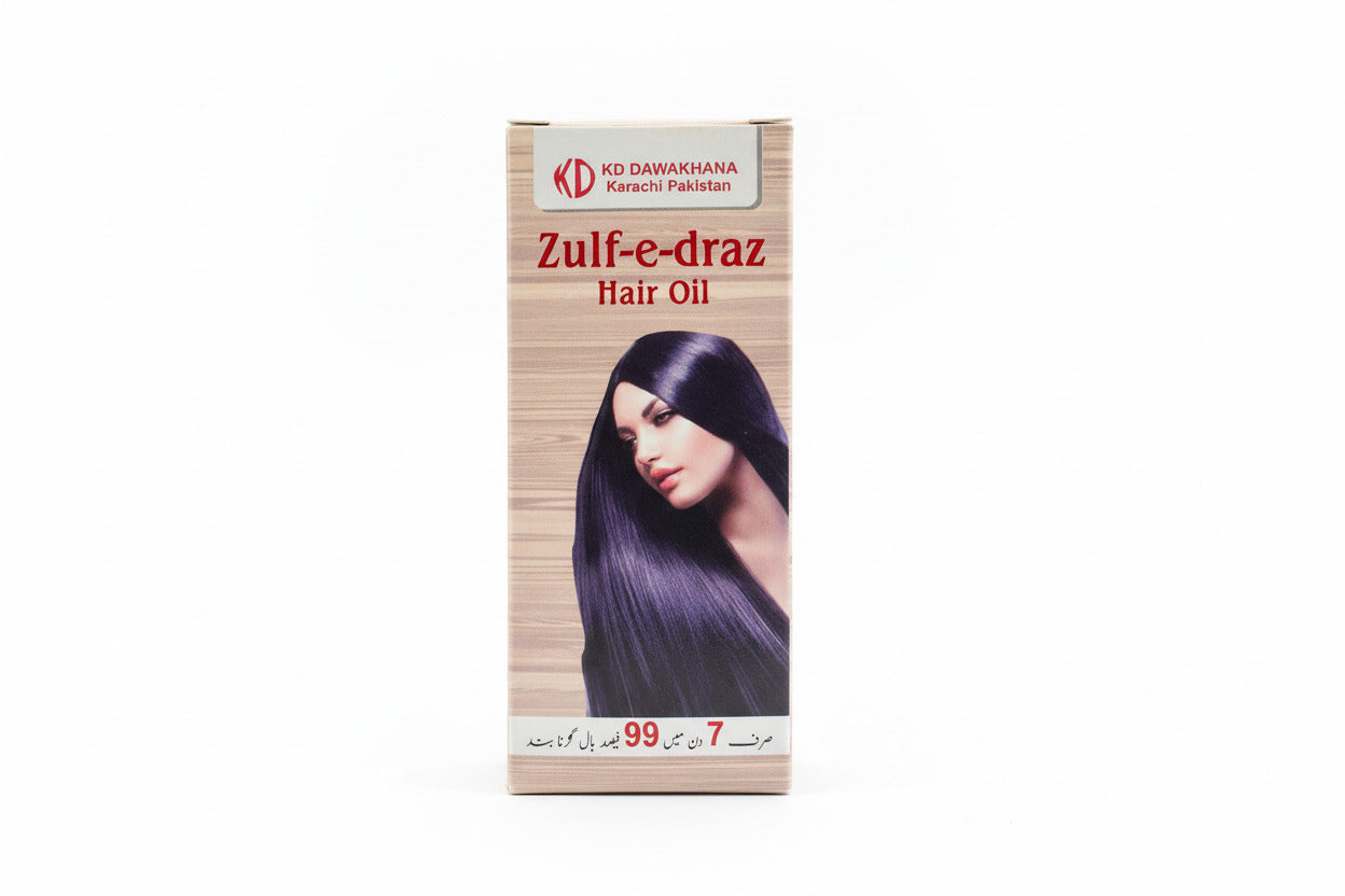 Zulf-e-draz hair oil packaging with a woman's face on it, displayed on a surface.