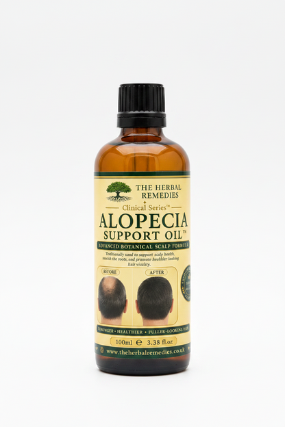 Bottle of Alopecia Support Oil with label on a white background