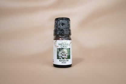 A bottle of ORGANIC KANUKA oil labeled as Natural Care, containing 10ml of product.