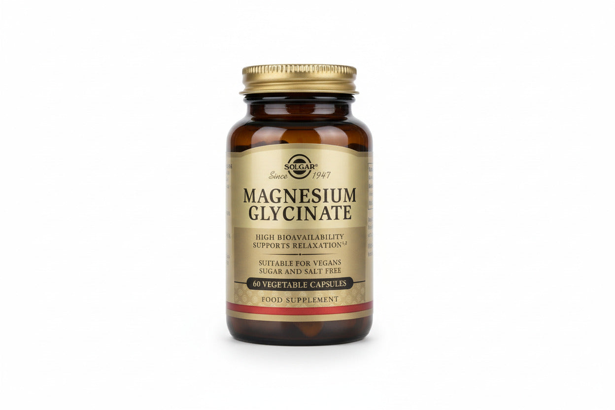 Solgar Magnesium Glycinate supplement bottle on a wooden surface