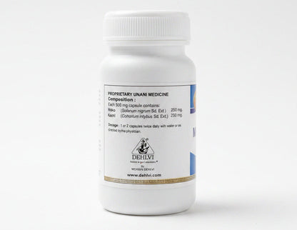 A white plastic bottle of Dehlvi Unani Medicine with a white cap, resting on a wooden surface. The label contains black text detailing the composition and dosage of the medicine, along with the Dehlvi brand logo.