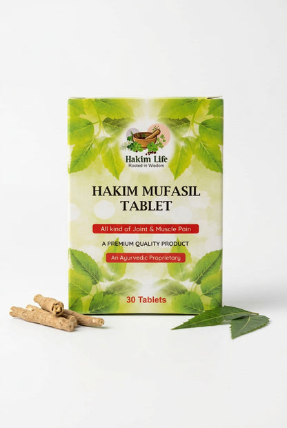A box of Hakim Mufasil Tablet by Hakim Life, featuring a green and white leaf design with red text accents, placed on a light wooden surface.