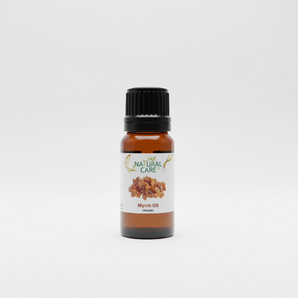 Bottle of Natural Care Myrrh Oil on a light gray background