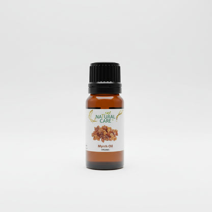 Bottle of Natural Care Myrrh Oil on a light gray background