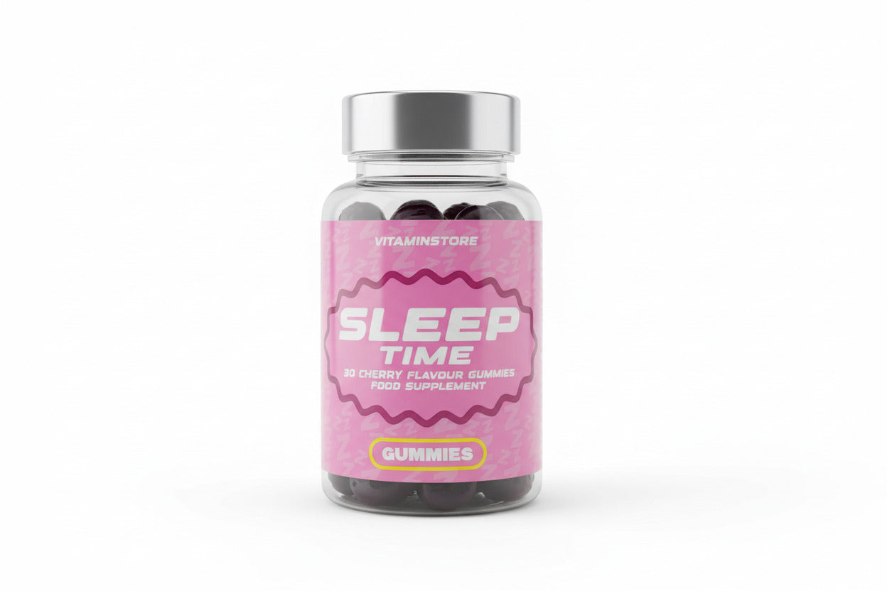 Bottle of 'Sleep Time' gummies held by a hand with a keyboard in the background