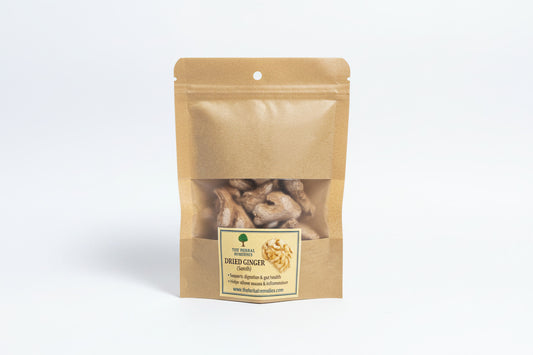 Bag of dried ginger with a label on a neutral background
