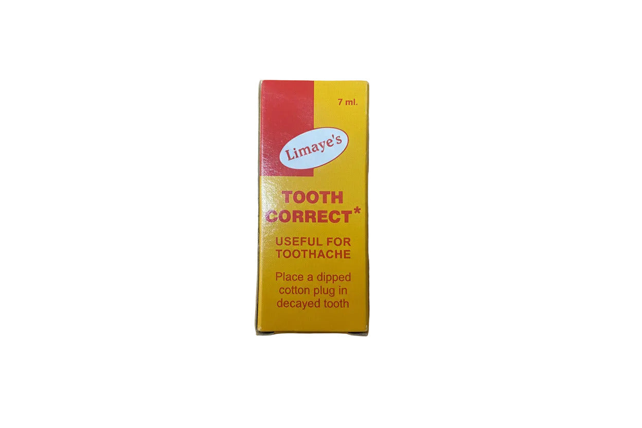 Yellow box of Limaye's Tooth Correct on a wooden surface