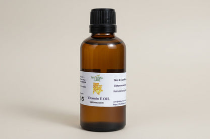 Vitamin E oil 30ml with a label on a beige background
