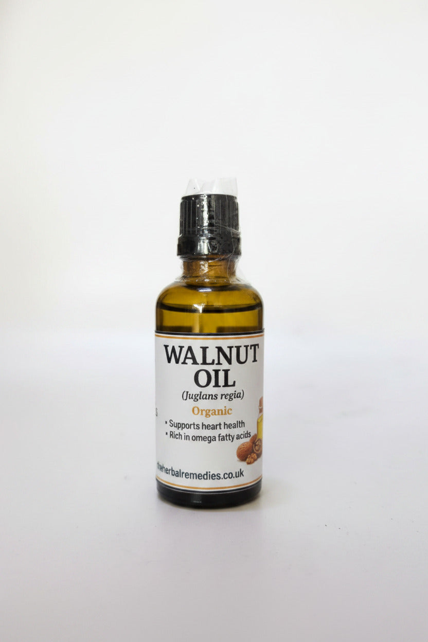Bottle of walnut oil with a label on a white background