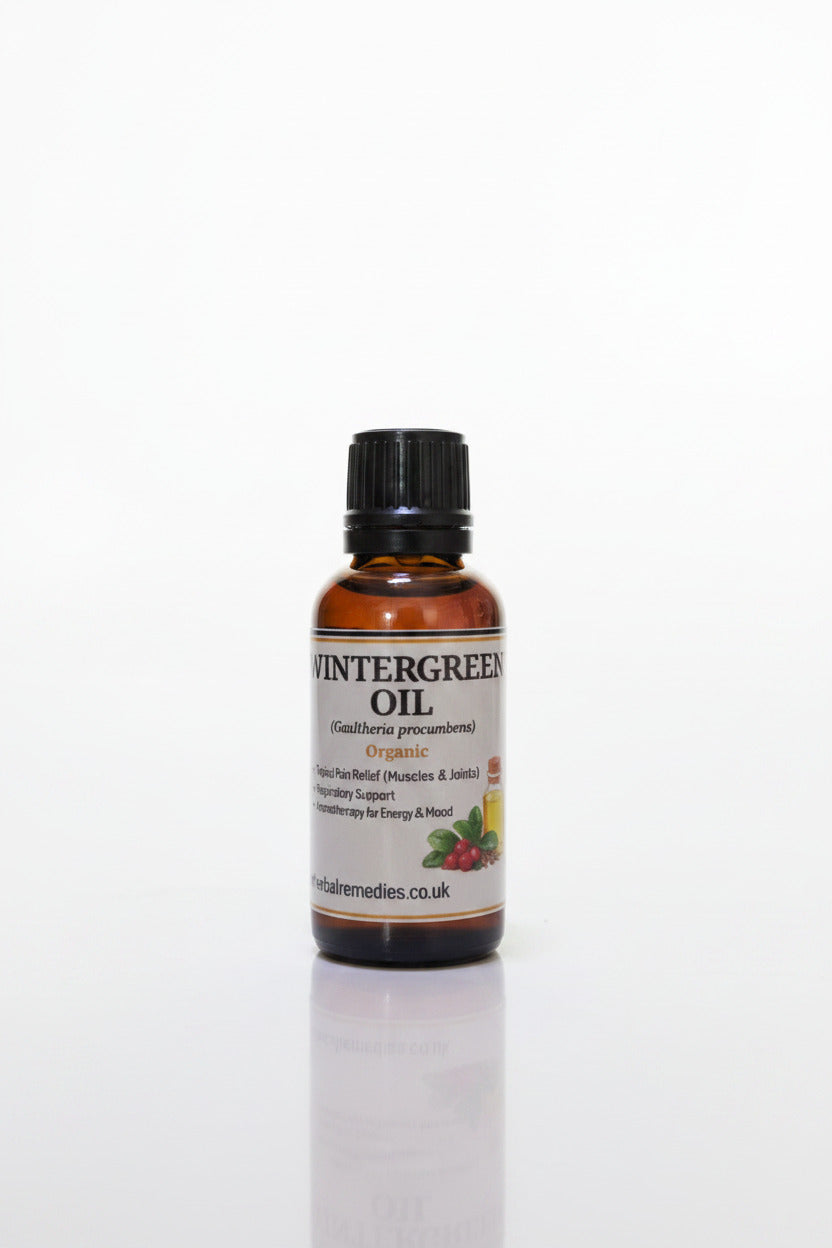 Bottle of Wintergreen oil on a white background